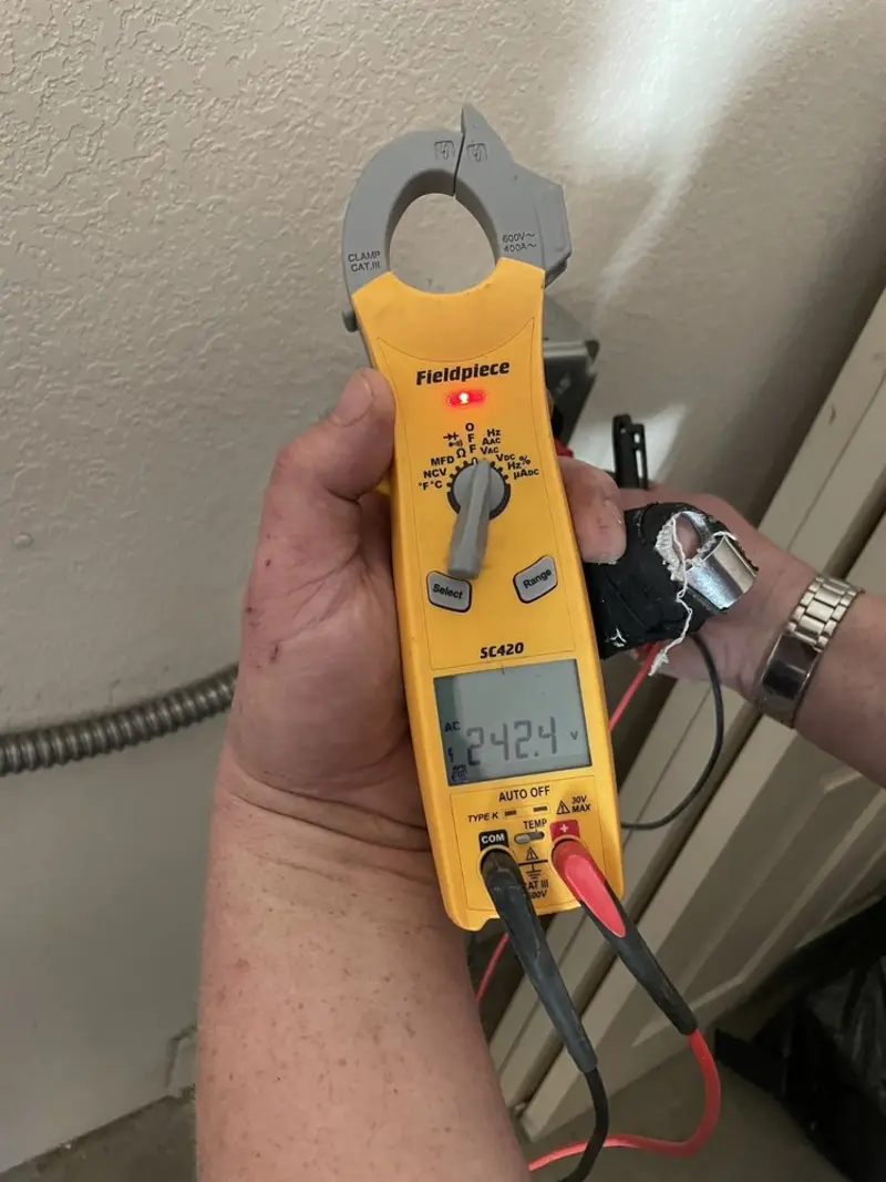 Voltage testing with clamp meter during Ceiling Fan Installation in Eldorado